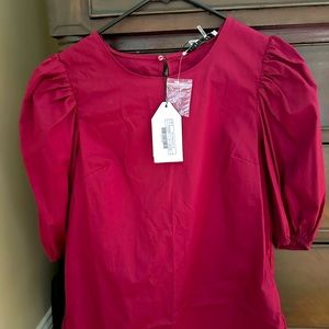 English factory garnet top.  Size small
